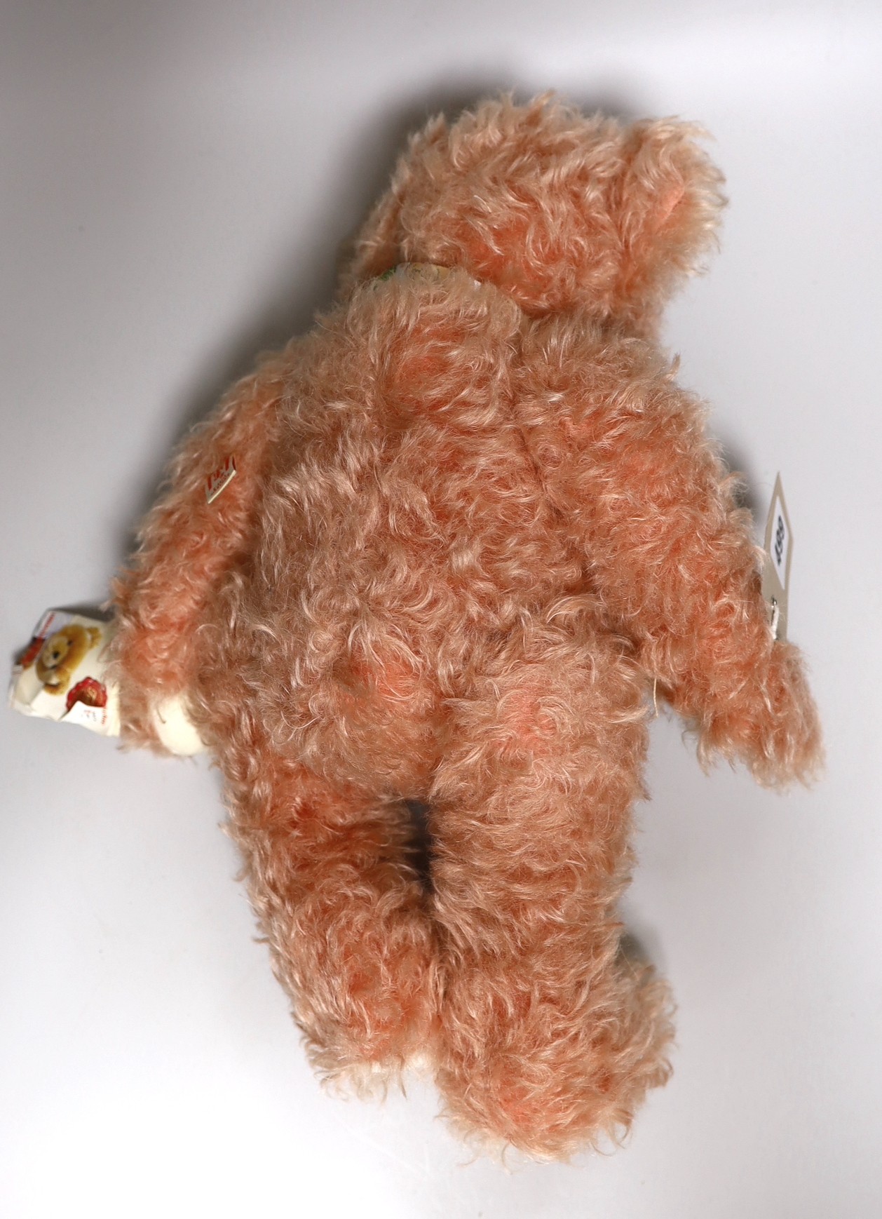 An Hermann ‘English Rose’ Teddy bear, G-Rumpy Bears ‘Emerson’, and a Deans blonde plush Teddy bear
